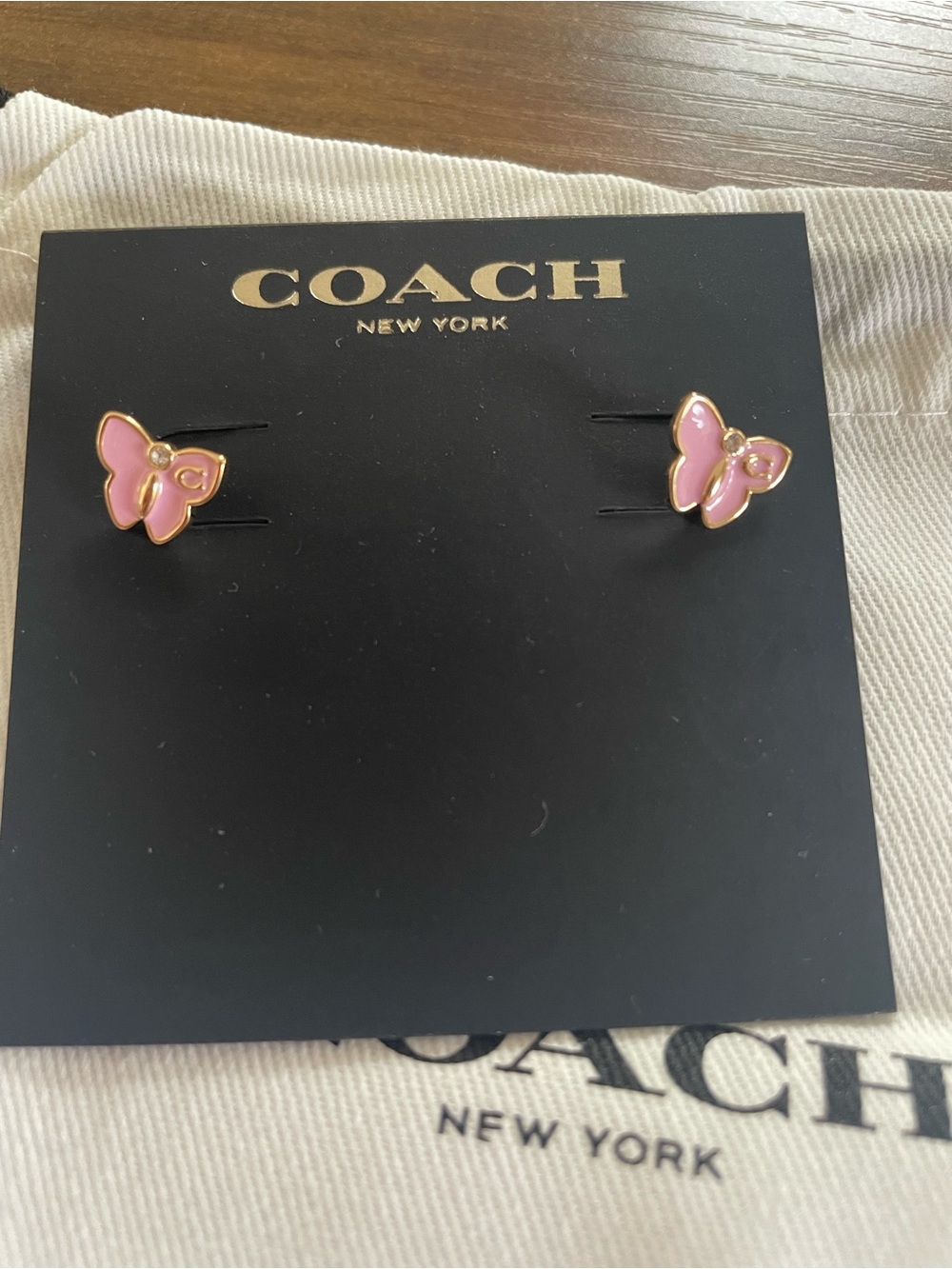 Coach mini pink butterfly post earrings